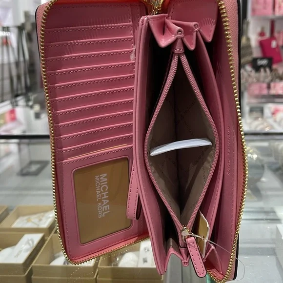 MICHAEL KORS JST 
Leather Continental Wristlet Phone Case Wallet 
Carnation 
NWT - Picture 8 of 16